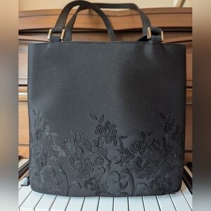 Double handled over the shoulder dressy black fabric bag medium size